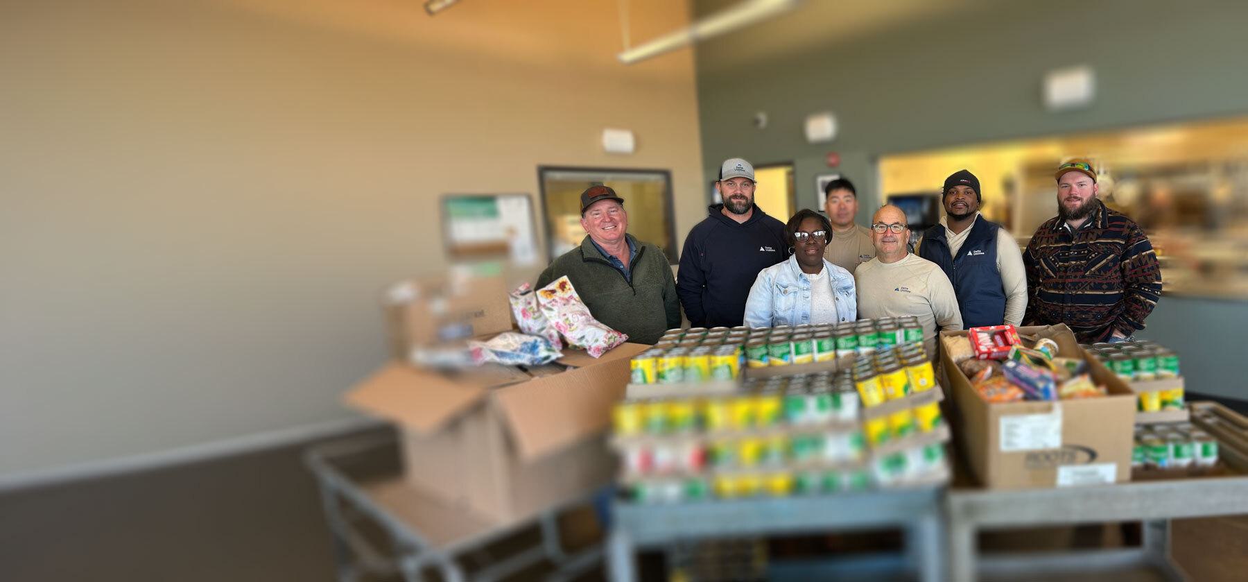 Delta Utilities employees delivering donations in Gulfport, MS.