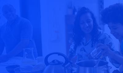 Family cooking on a natural gas stove with a royal blue overlay